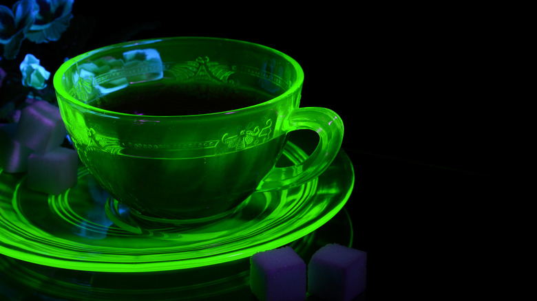 glowing green uranium glass teacup and saucer