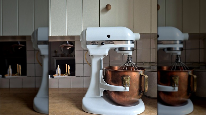 a copper mixing bowl attached to KitchenAid mixer