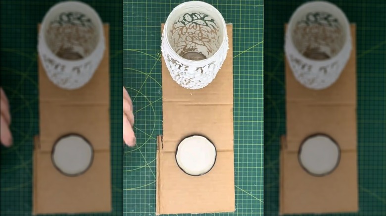 Glass jar and lid covered with chunky texture paste for unique DIY project