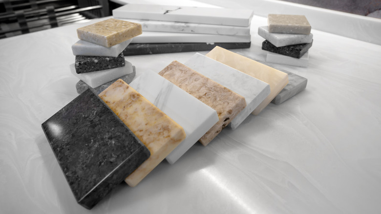 Samples of different countertop materials laid out.