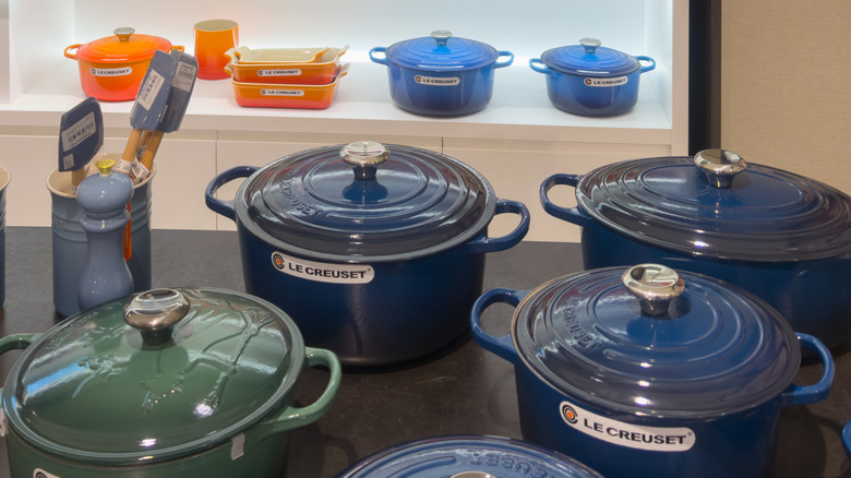 Le Creuset pots in green and blue