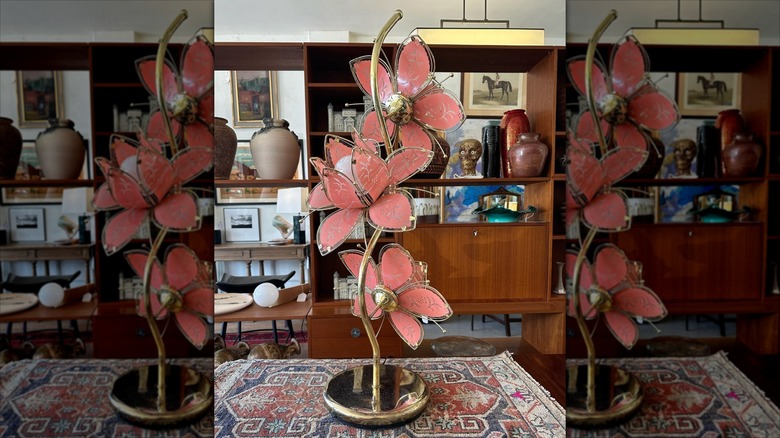 A pink vintage lotus lamp in a secondhand store