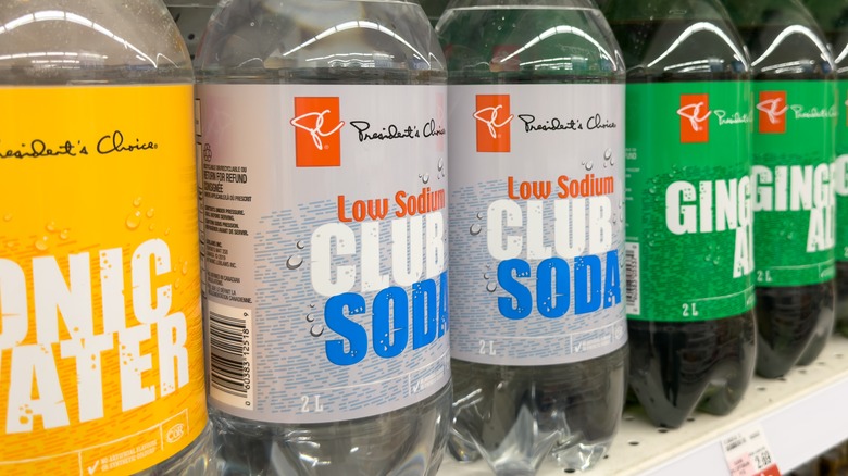 club soda bottles on shelves at a store