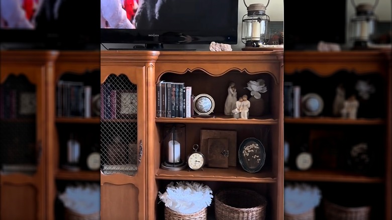 Close-up of a hutch top used as a TV cabinet