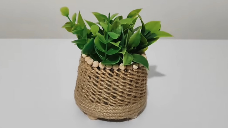 Mini DIY planter with a twine and wood bead exterior