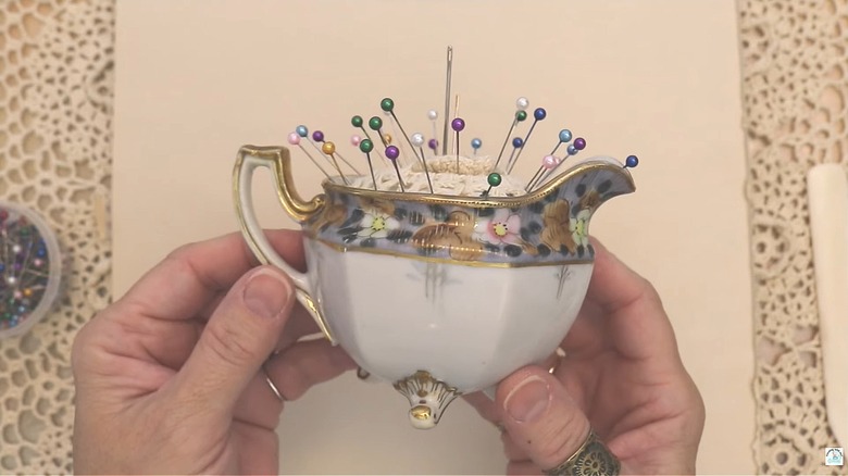 Antique teacup pin cushion mde with repurposed doily