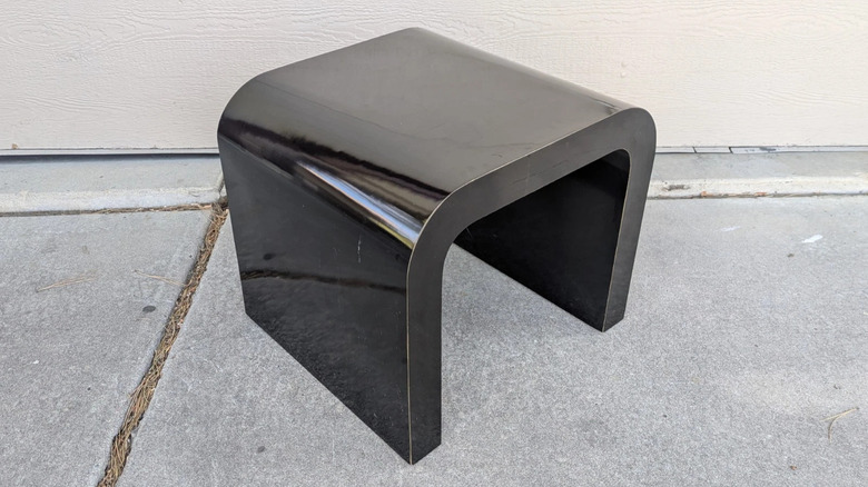 Classic 1980s postmodern black lacquer waterfall end table