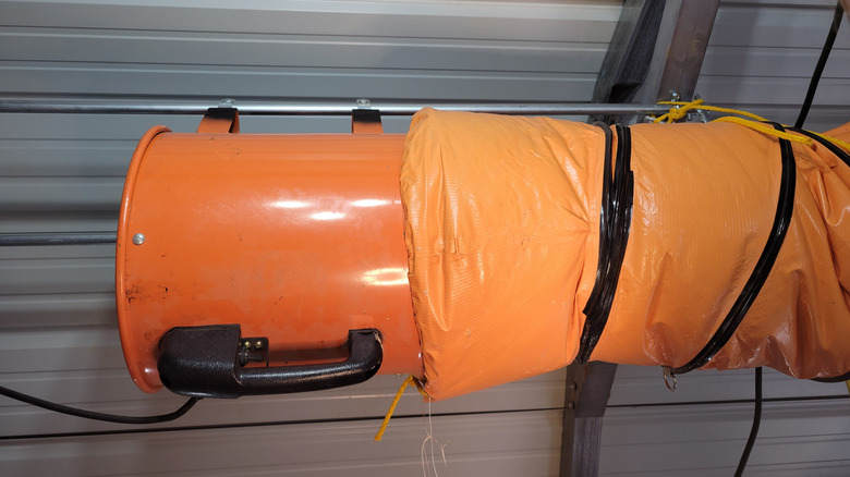Portable exhaust fan reused as workshop "attic" fan