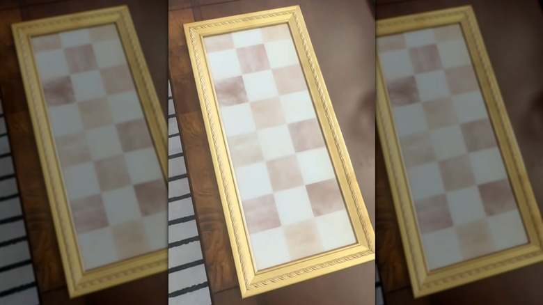 DIY tray made out of thrifted framed mirror and peel and stick tiles
