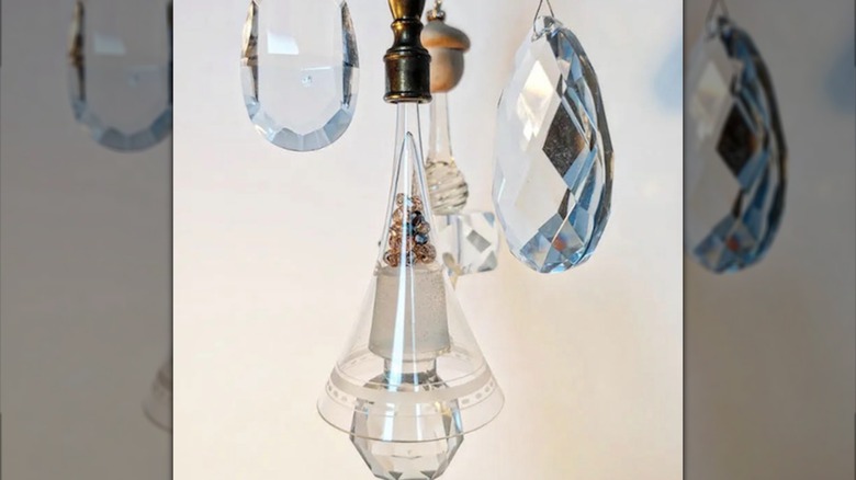 Glass bottle stopper sun catcher.
