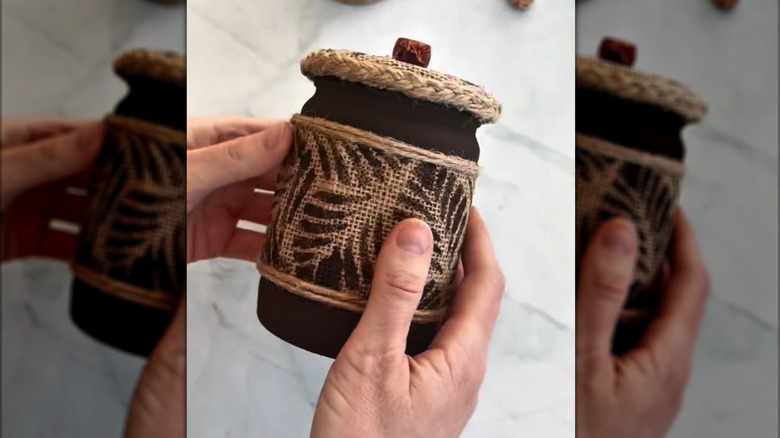 Finished DIY mason jar as rustic farmhouse decor with burlap