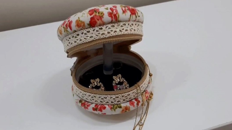 DIY jewelry case made from jar lids