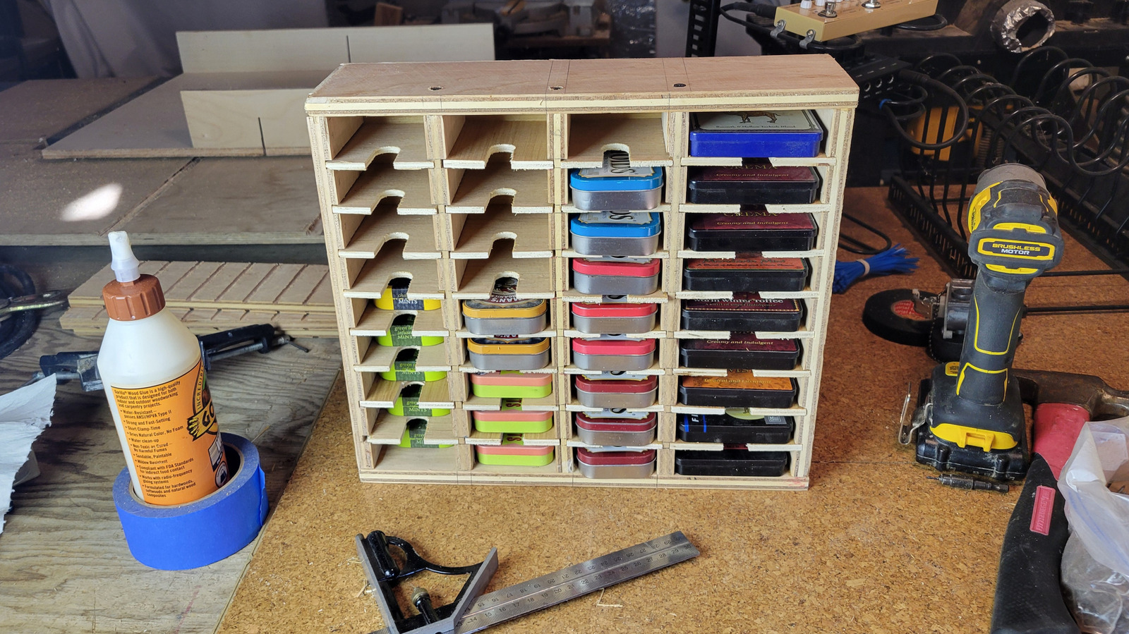 Reuse Mint Tins In This Scrap Wood DIY Storage Cabinet