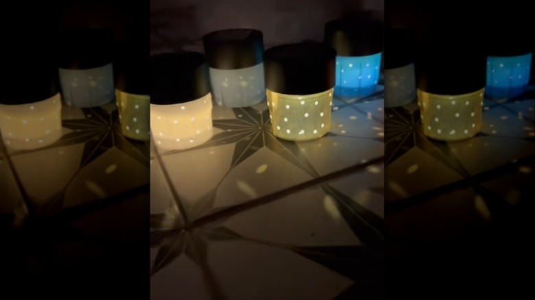 mini portable lamps made out of spray paint can lid