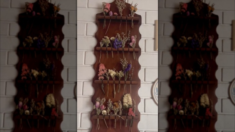 Spoon rack turned into home decor with dried flowers