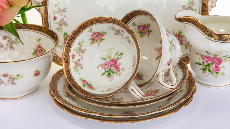 A vintage dishware set on a shelf