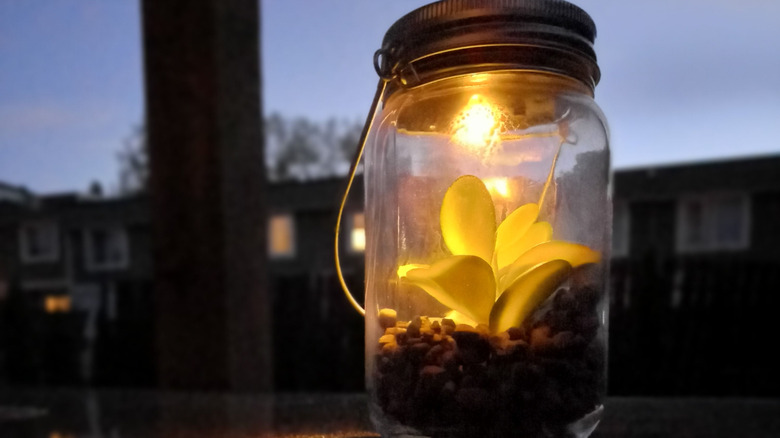 A jar made into a floral luminary.