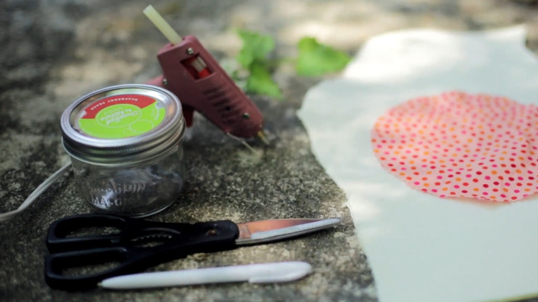 Supplies used for a DIY sewing kit made from Mason jar