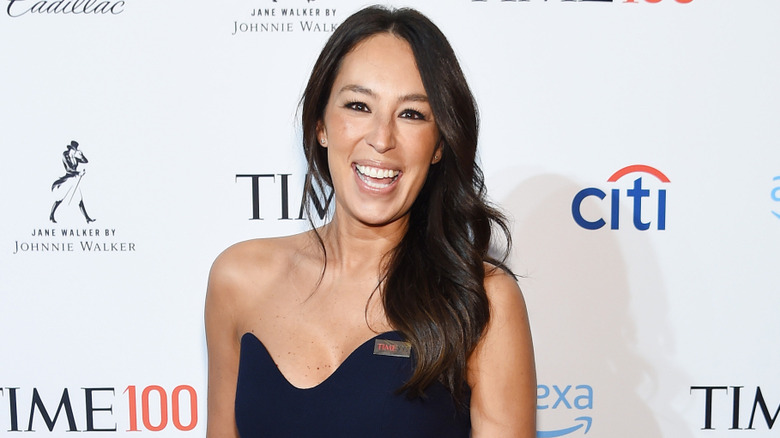 Joanna Gaines smiling looking at the camera