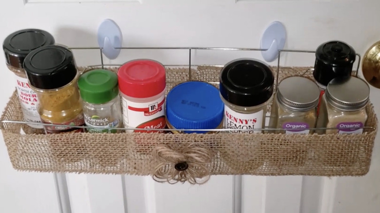 A DIY wire spice rack covered in burlap