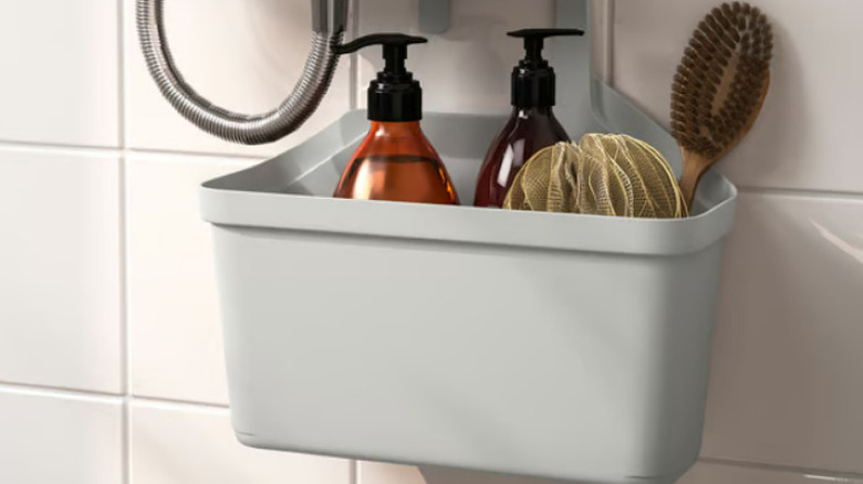 IKEA TANGHALLAN Basket with bottles, brush, and loofah