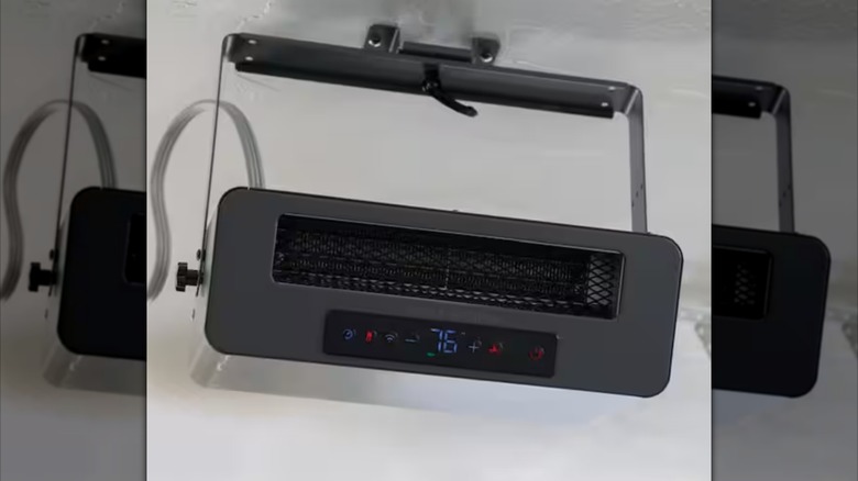 The Heat Storm heater hanging on a wall