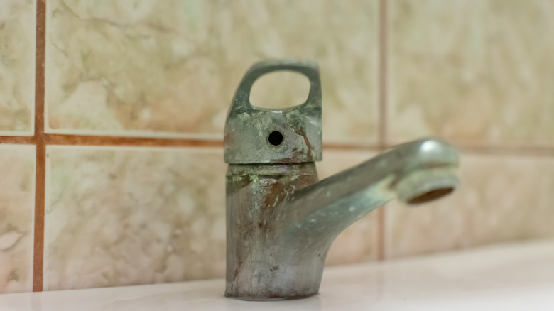 Hard water stains on a faucet