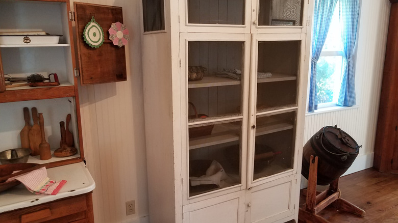 Vintage pie safe cooling cabinet in kitchen