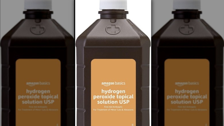 Brown bottle of Amazon Basics hydrogen peroxide