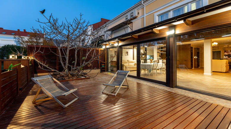 Picture of a well-lit deck at night.