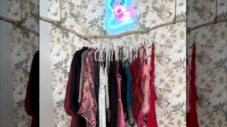 Branch turned into DIY clothes hanging solution