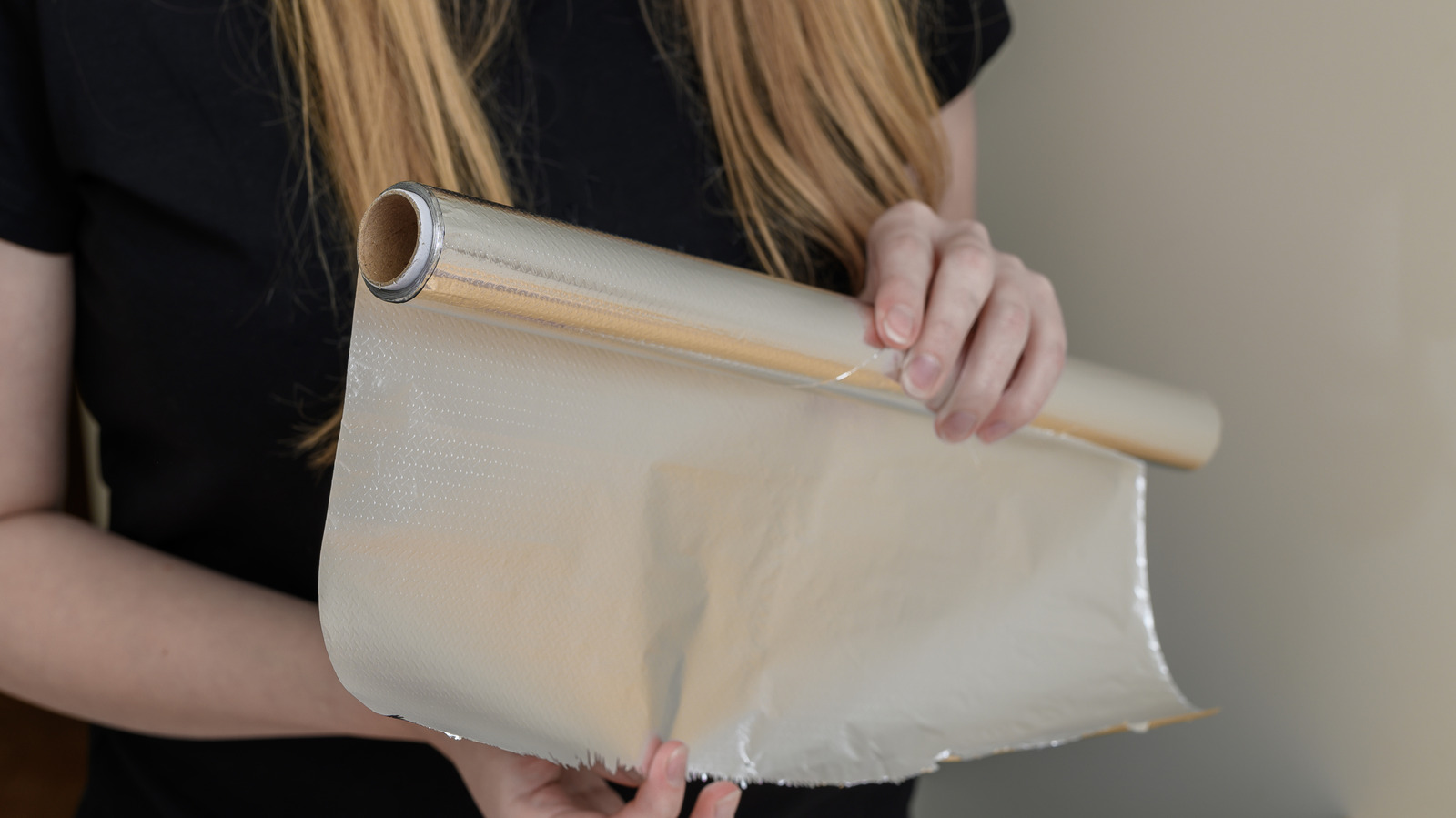 This Bathroom Essential Makes Organizing Aluminum Foil & Parchment Paper Easy