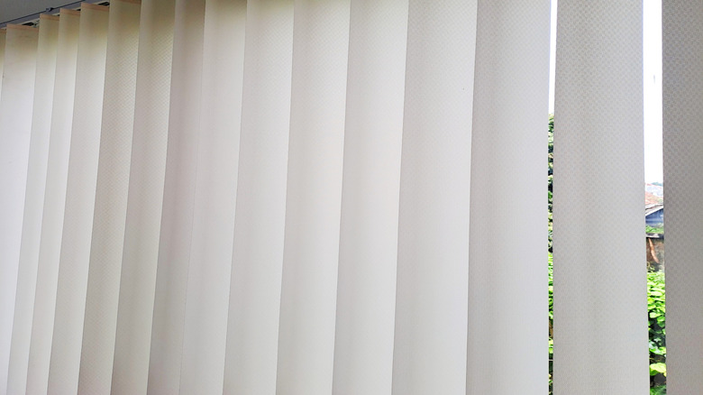 Closeup of plastic white vertical blinds