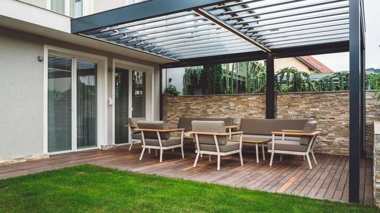 Wooden patio with chairs and table