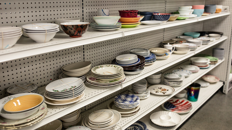 Assorted dishes at a thrift store