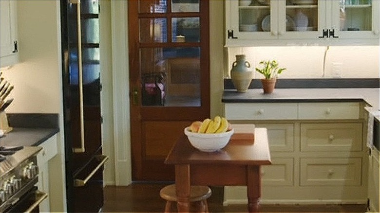 English country kitchen with black mist granite countertops