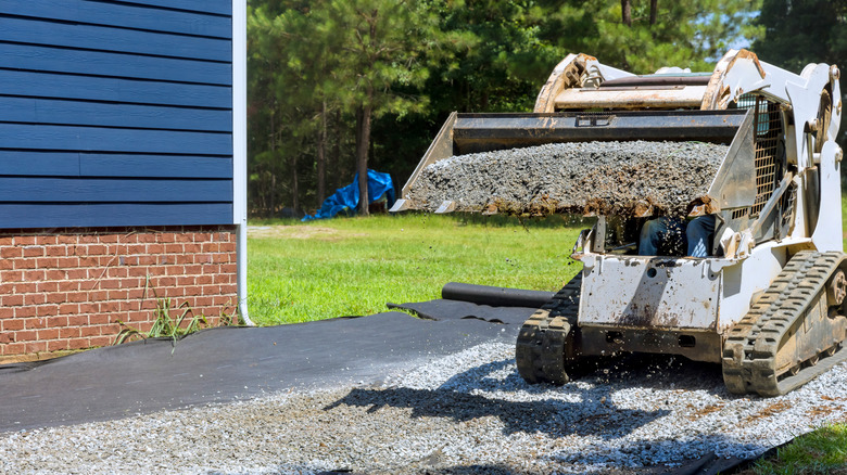 Gravel being dumped onto a driveway