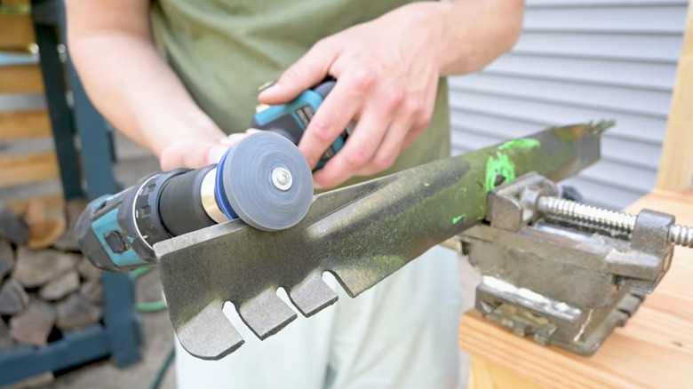 sharpening mower blade with stone drill attachment