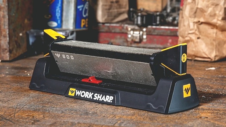 A close-up of the Work Sharp Tri-brasive Benchtop Knife Sharpener sharpening system