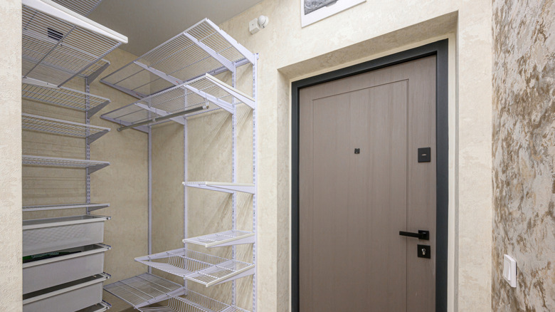 A closet with wire shelves