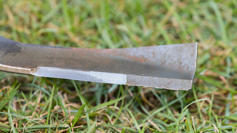 A partially sharpened mower blade