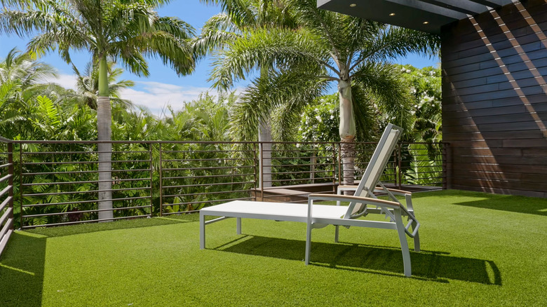 enclosed patio with artificial turf
