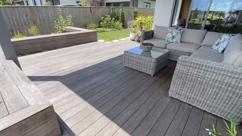 Gray bamboo decking with patio furniture