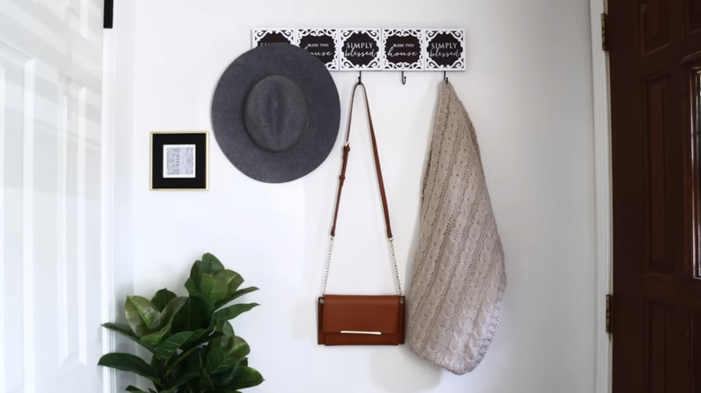 DIY coat rack hanging hat, purse, and shawl