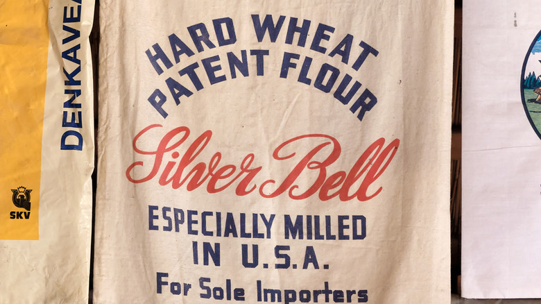 Vintage flour sack hanging in a museum.