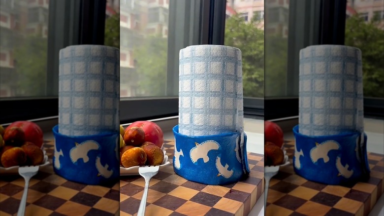 DIY clay paper towel holder with painted birds