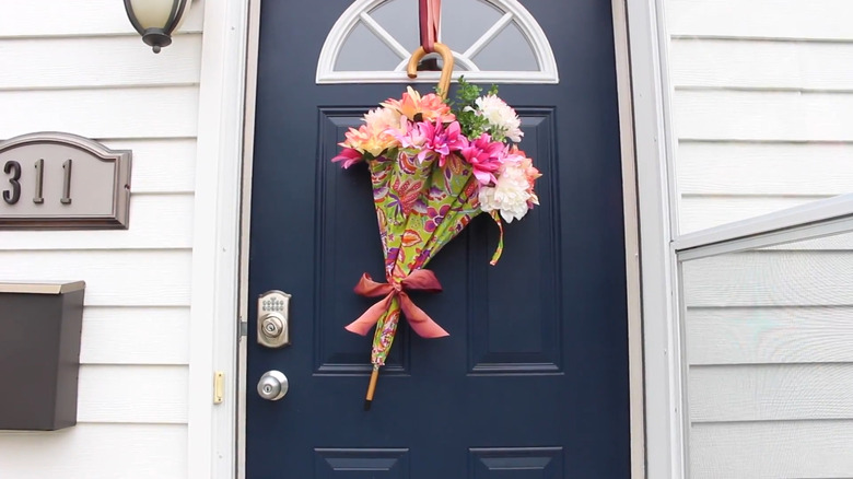Flower-filled umbrella door hanger