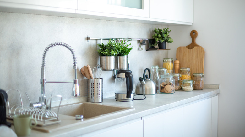 A kitchen counter and backsplash made from corian