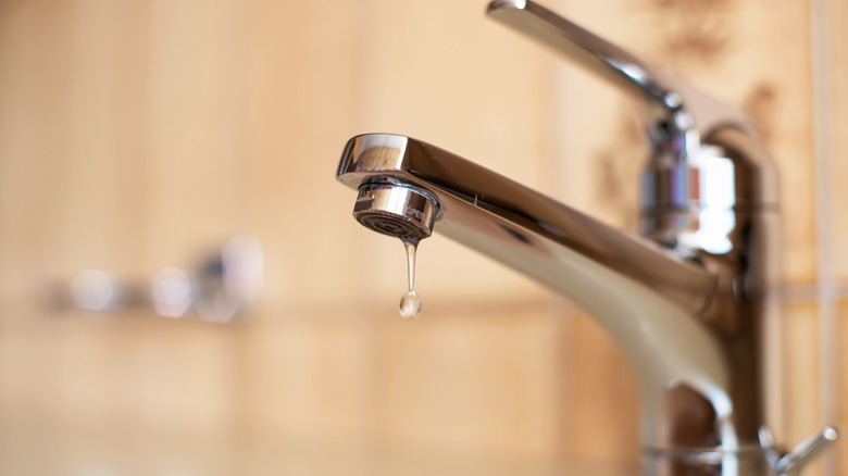 Indoor faucet slowly dripping water to prevent frozen pipe