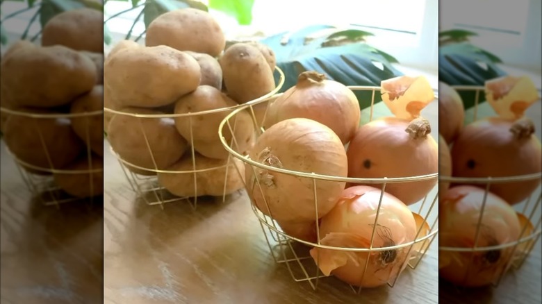 Potatoes and onions are contained in gold wire baskets from Dollar Tree